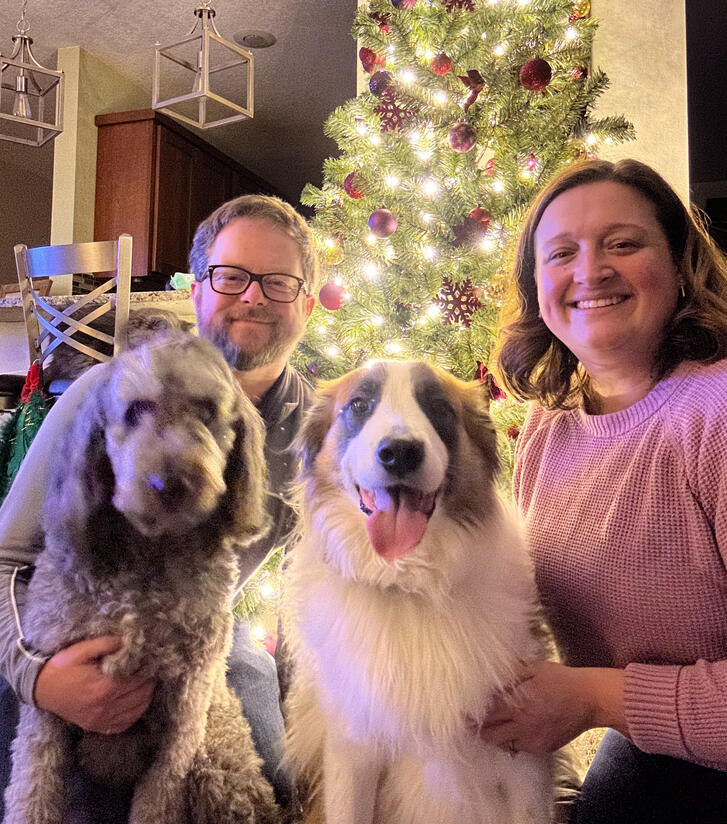 Family photo in front of our Christmas tree. Family photo in front of our Christmas tree.